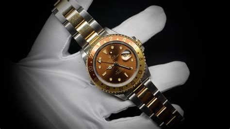 rolex gmt acciaio e oro occhio di tigre|Rolex GMT.